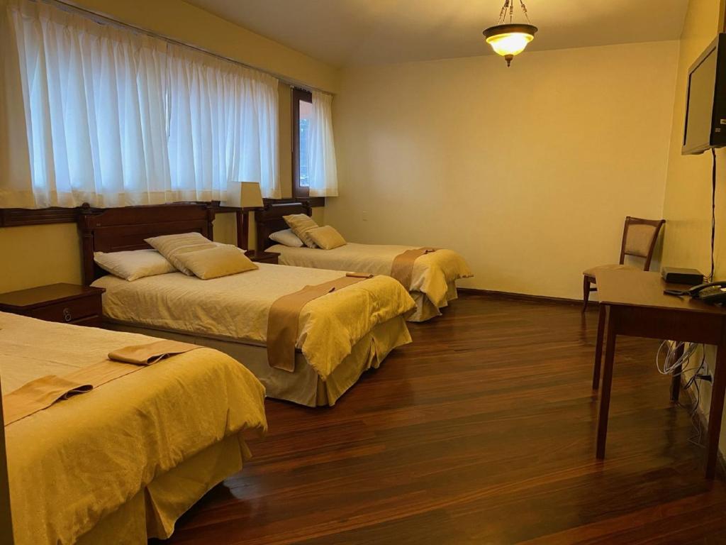 Habitación Triple con Bañera (4 personas)